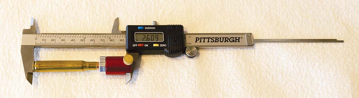 Measurement setup for cartridge ogive length (OAL).